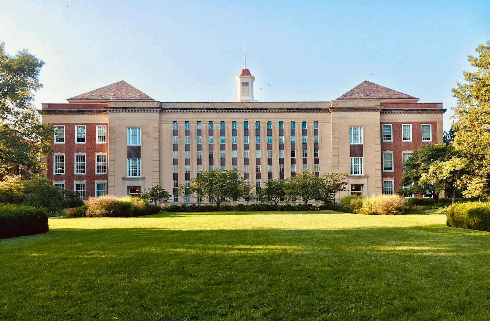 Institutional brick building with a front lawn
