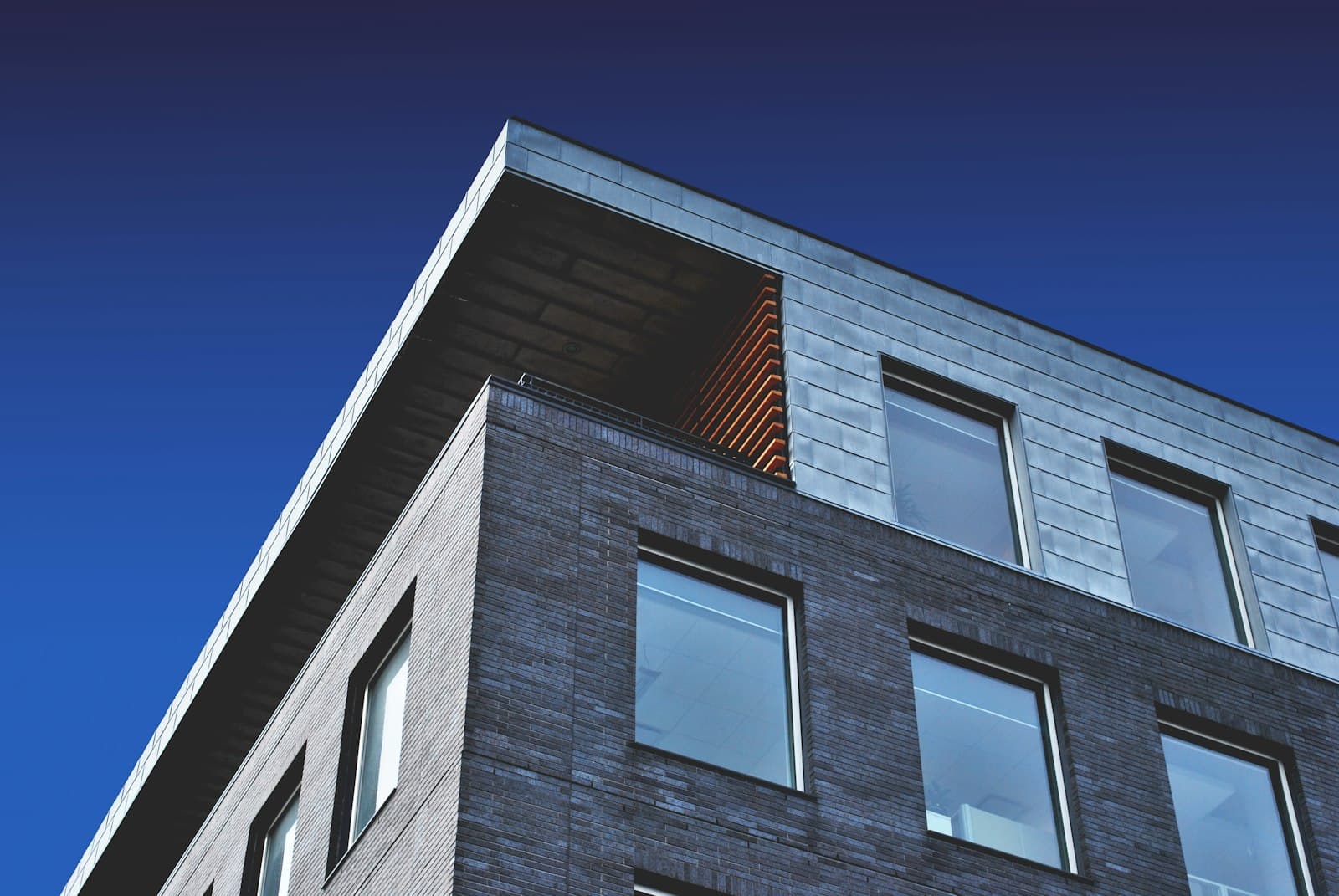 Exterior windows on a brick institutional building
